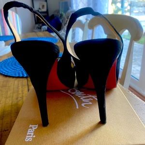 Black Christian Louboutin peep toe heels
